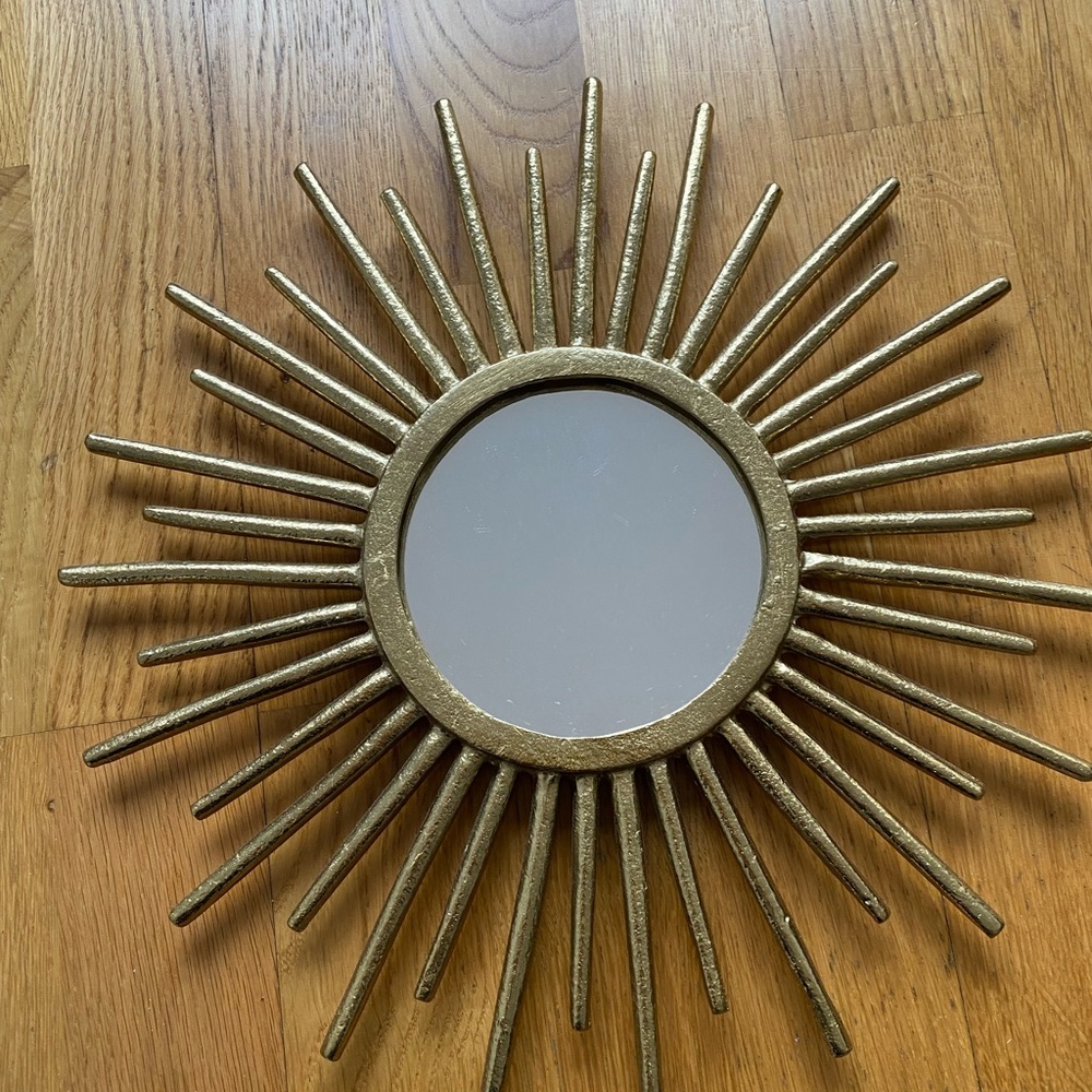 Sunburst mirror mid century style. Gold 12.5 inches in diameter.